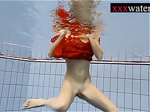 fantastic torrid lady swimming in the pool